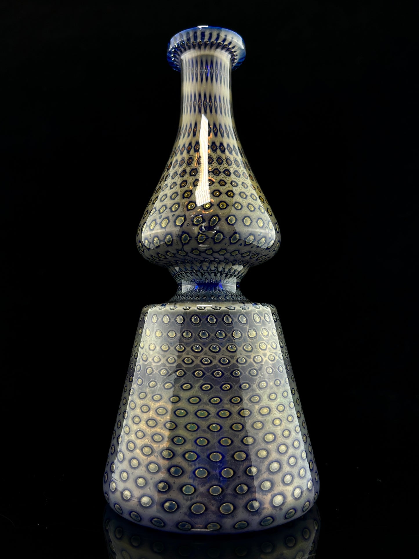 Bubble Trap Tube with Vortex Holes